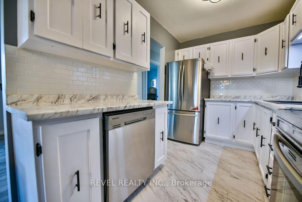 Photo 13 of 545 Lonergan Boulevard, Timmins, TNW - Riverpark — HOMEH