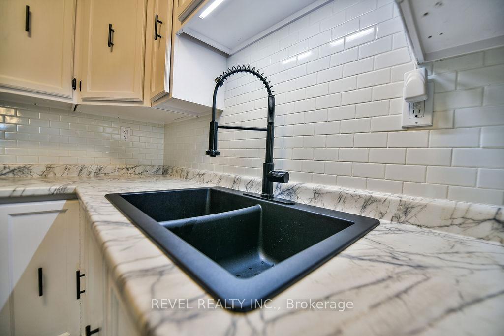 Photo 24 of 545 Lonergan Boulevard, Timmins, TNW - Riverpark — HOMEH