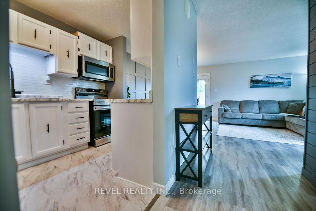 Photo 23 of 545 Lonergan Boulevard, Timmins, TNW - Riverpark — HOMEH