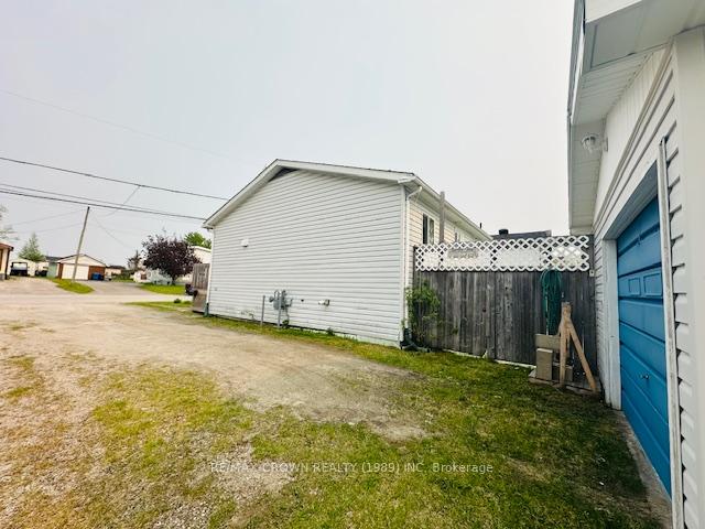 Photo 2 of 11 Cartier Avenue, Kapuskasing — HOMEH