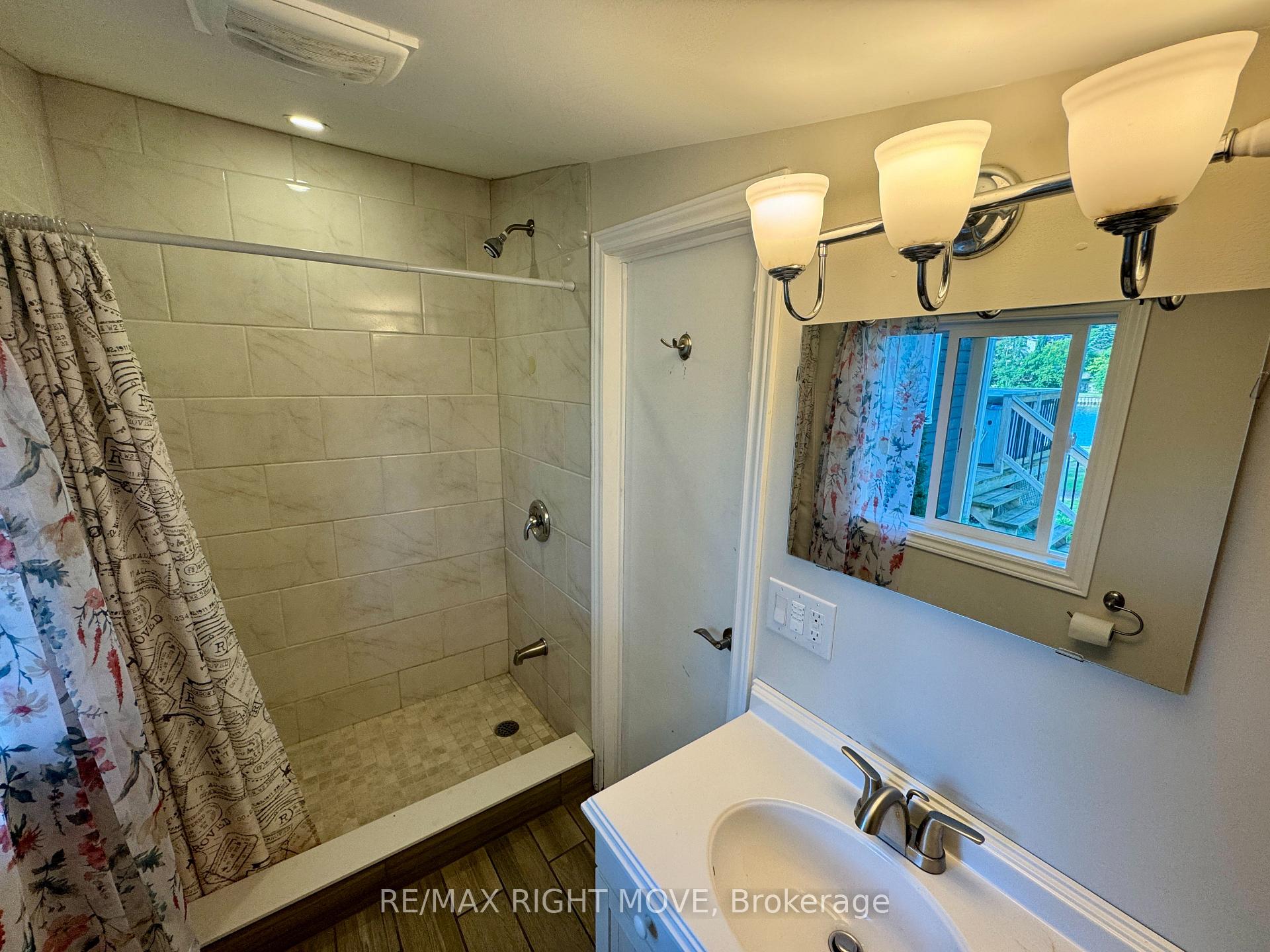 Photo 12 of 993 Mosley Street, Wasaga Beach — HOMEH