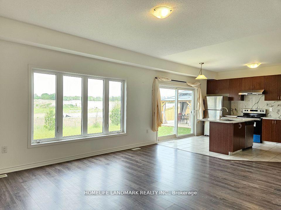 Photo 5 of 20 Sandhill Crane Drive, Wasaga Beach — HOMEH