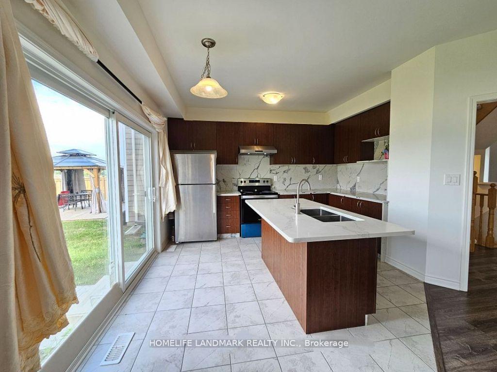 Photo 2 of 20 Sandhill Crane Drive, Wasaga Beach — HOMEH