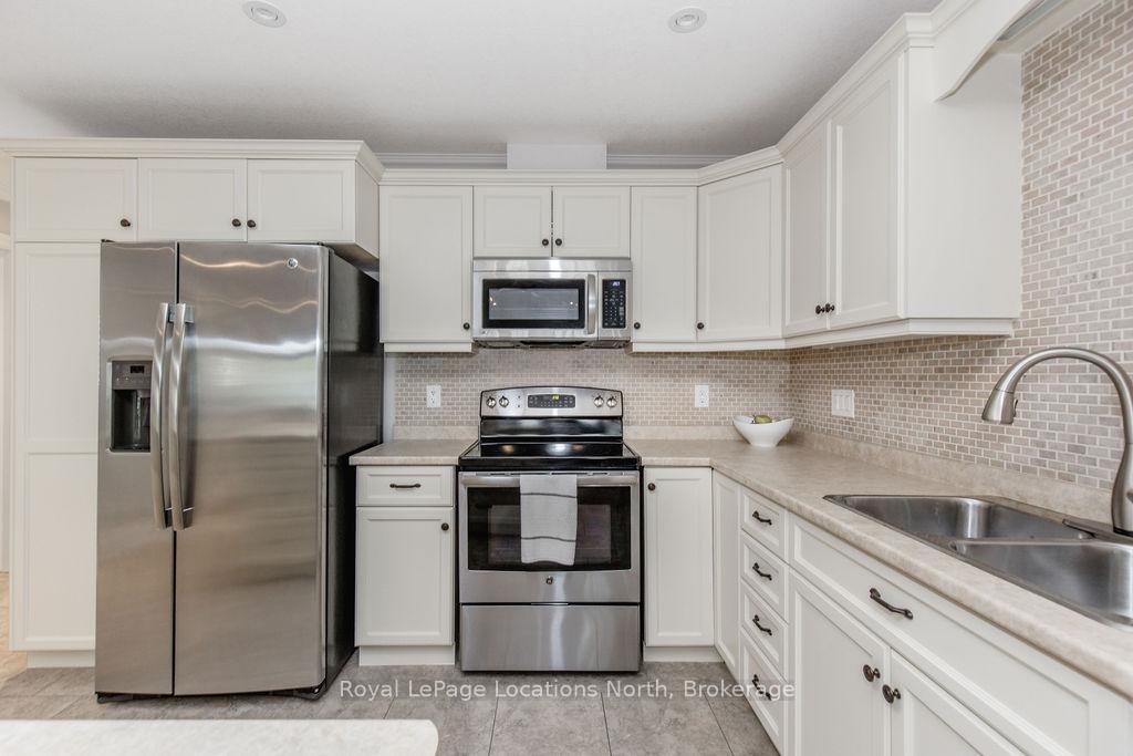 Photo 6 of 86 Clover Crescent, Wasaga Beach — HOMEH