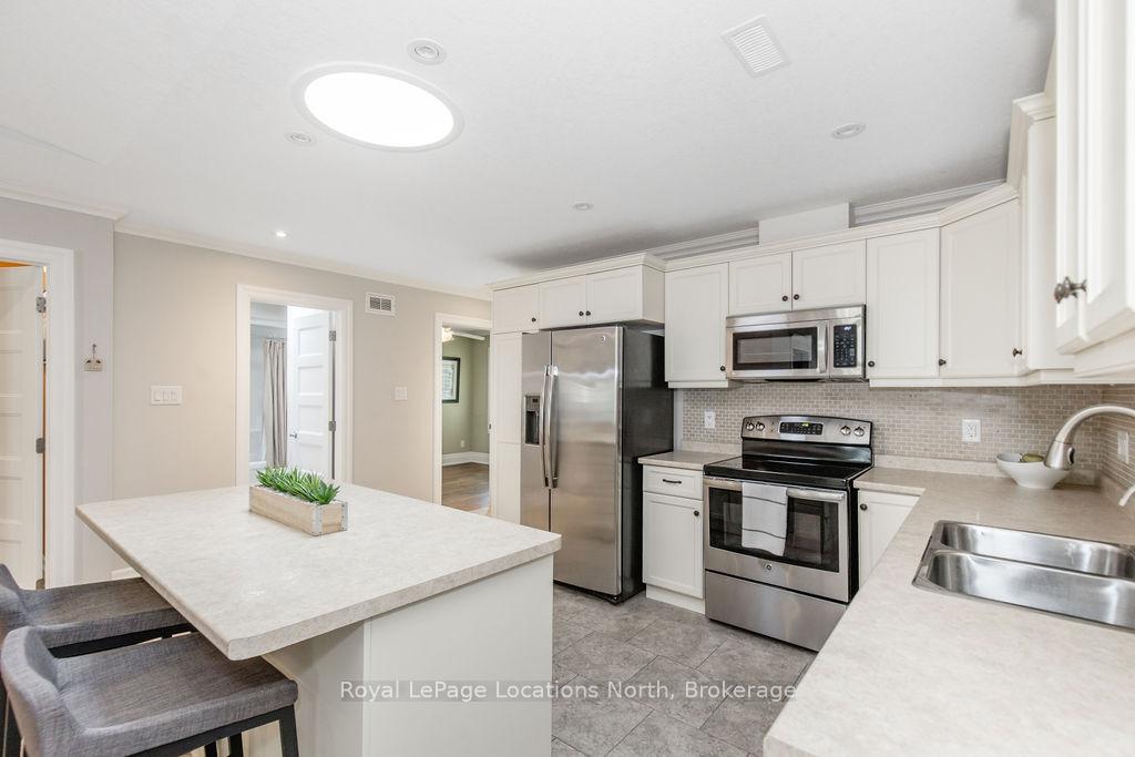 Photo 11 of 86 Clover Crescent, Wasaga Beach — HOMEH