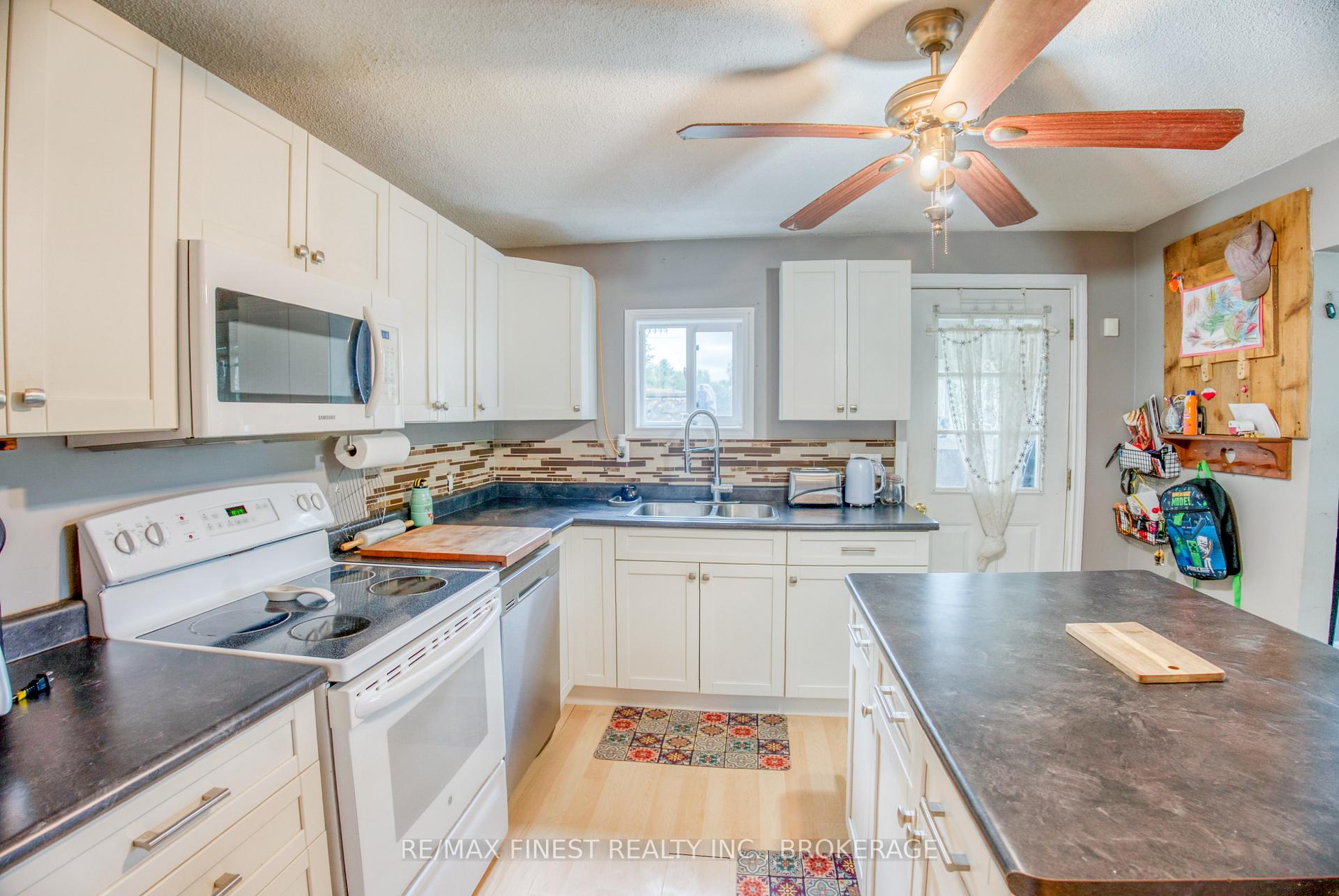 Photo 3 of 12910 Road 38, Frontenac, Frontenac Centre — HOMEH