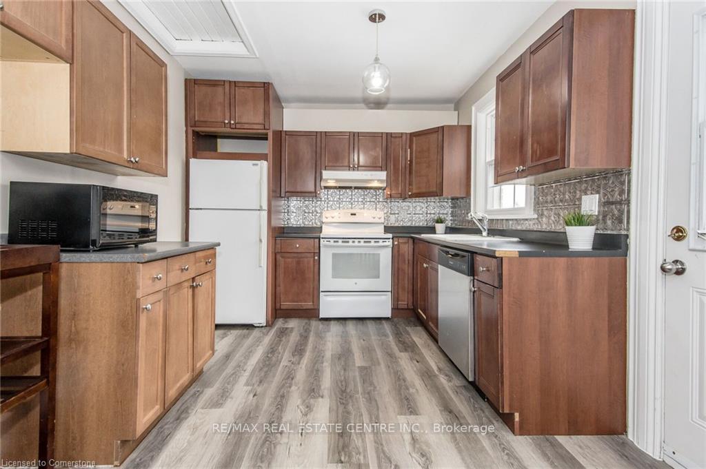 Photo 7 of 93 Edinburgh Road S, Guelph, Downtown — HOMEH