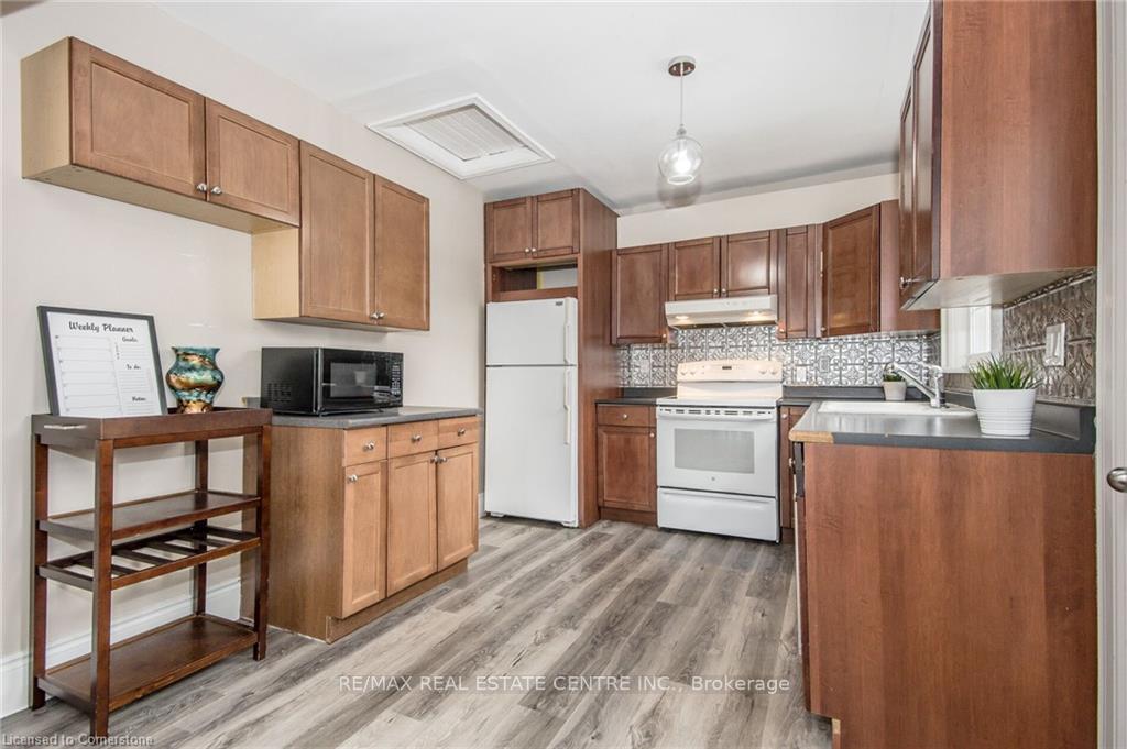 Photo 8 of 93 Edinburgh Road S, Guelph, Downtown — HOMEH