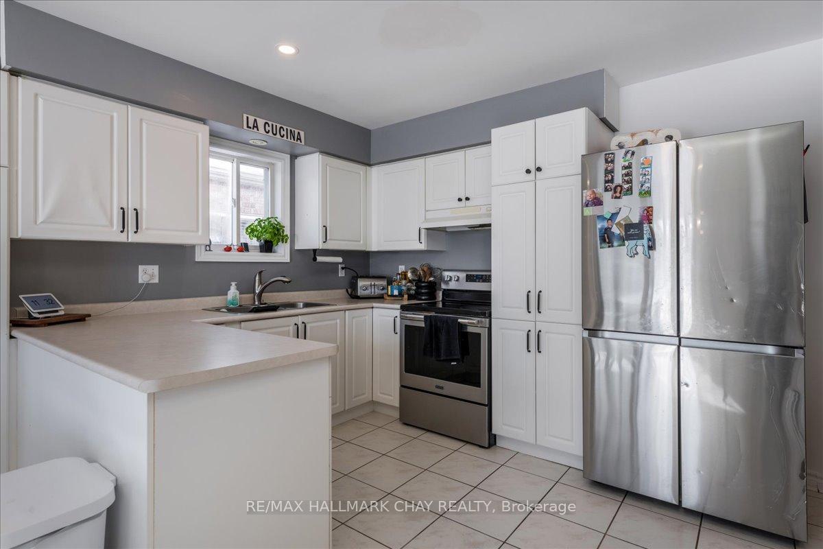 Photo 10 of 73 Nicklaus Drive, Barrie, East Bayfield — HOMEH