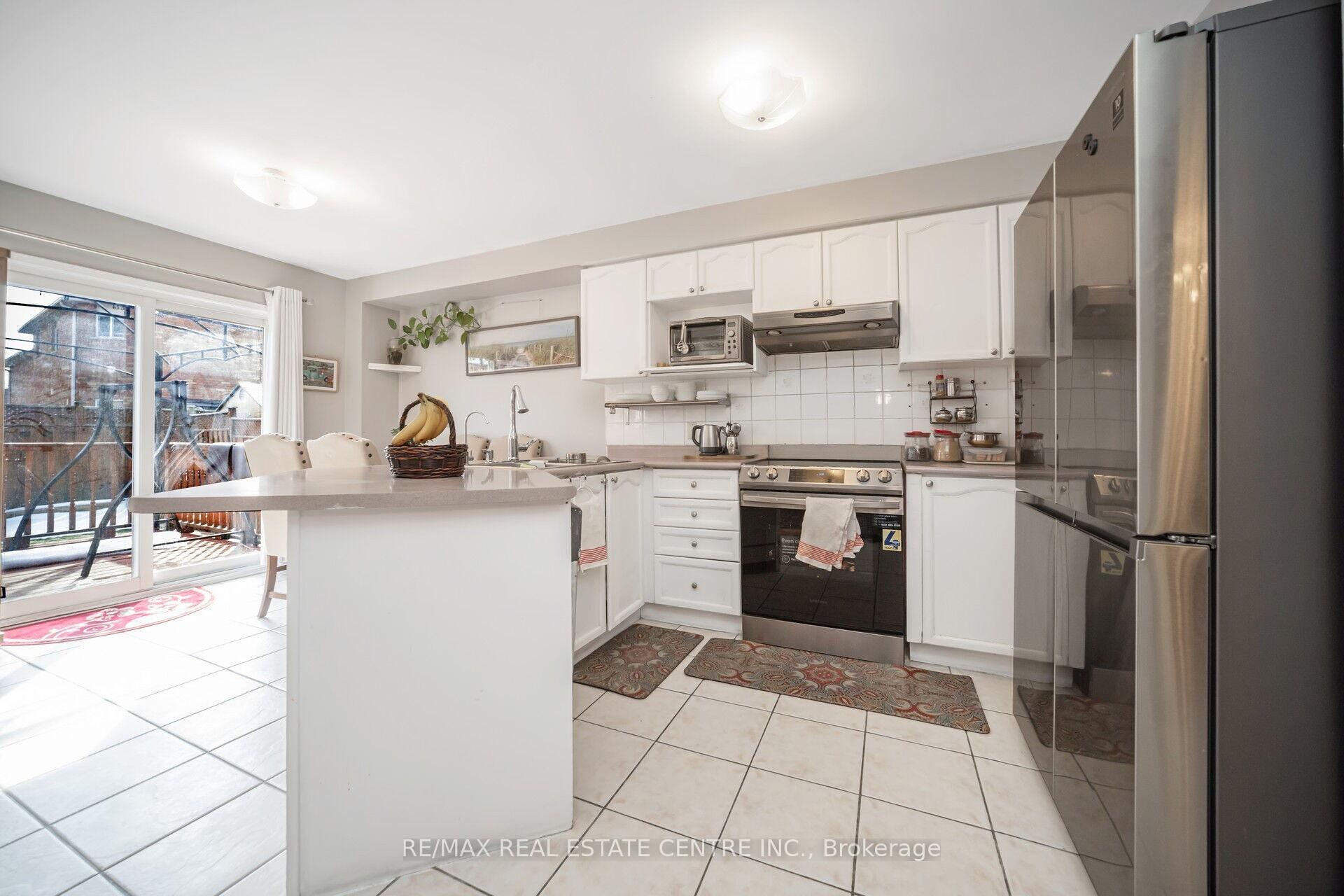 Photo 8 of 19 Blue Lake Avenue, Brampton, Fletcher's Meadow — HOMEH