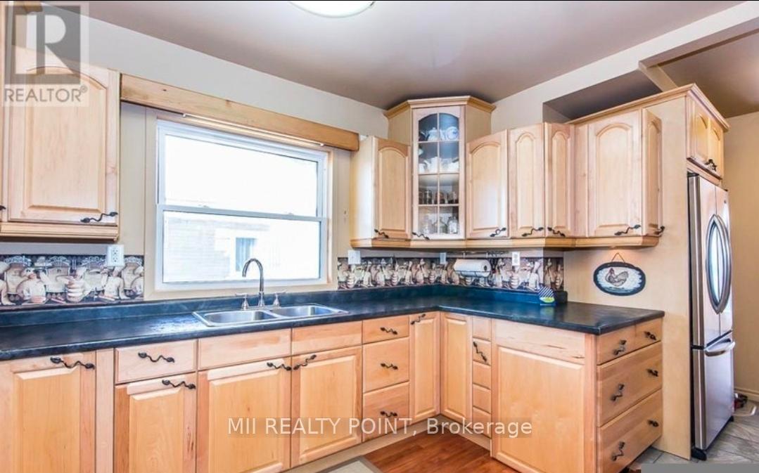 Photo 3 of 49 Copper Street, Sudbury Remote Area — HOMEH