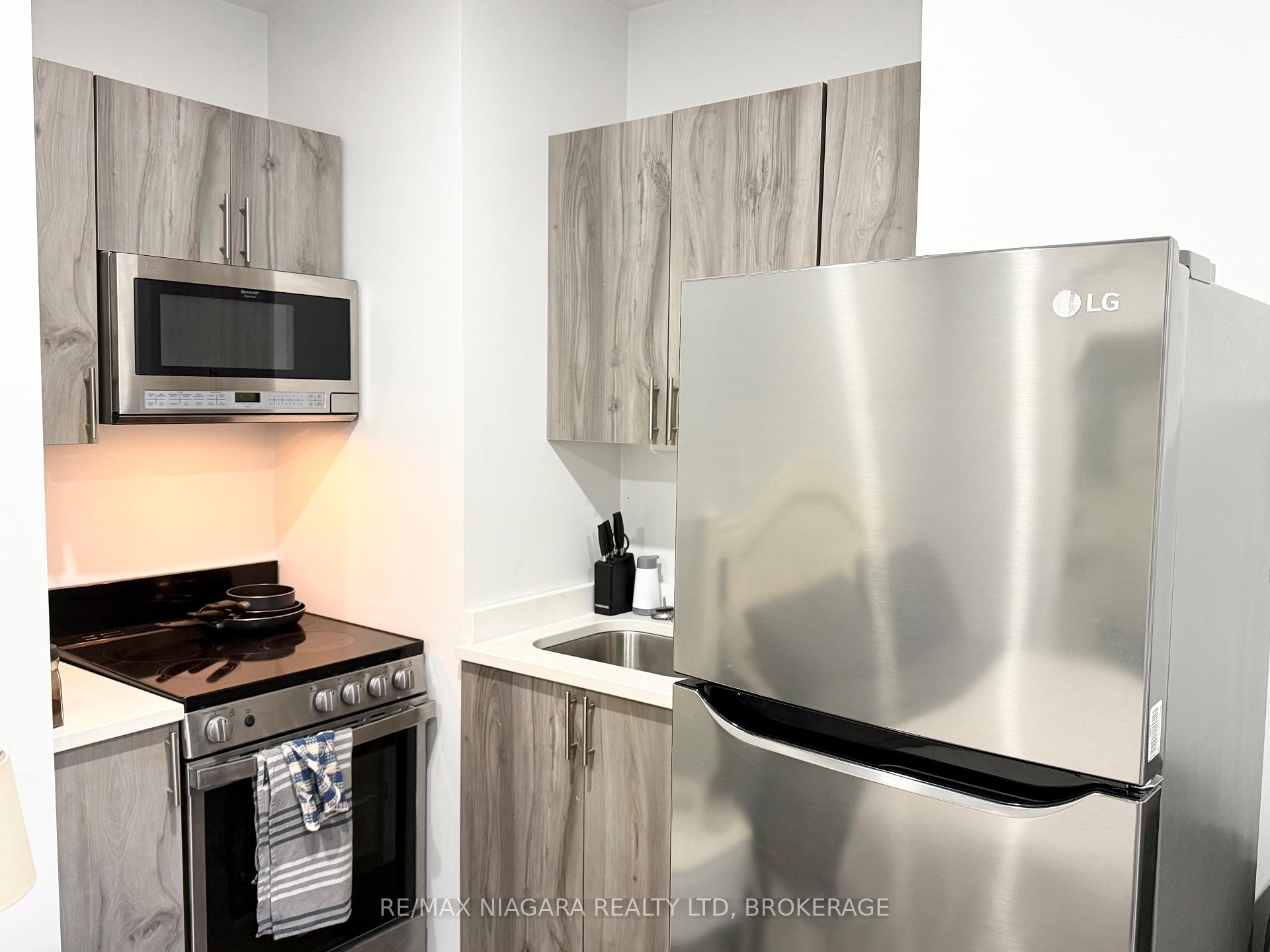 Photo 4 of Unit Unit 4, 4701 River Road, Niagara Falls, Downtown — HOMEH