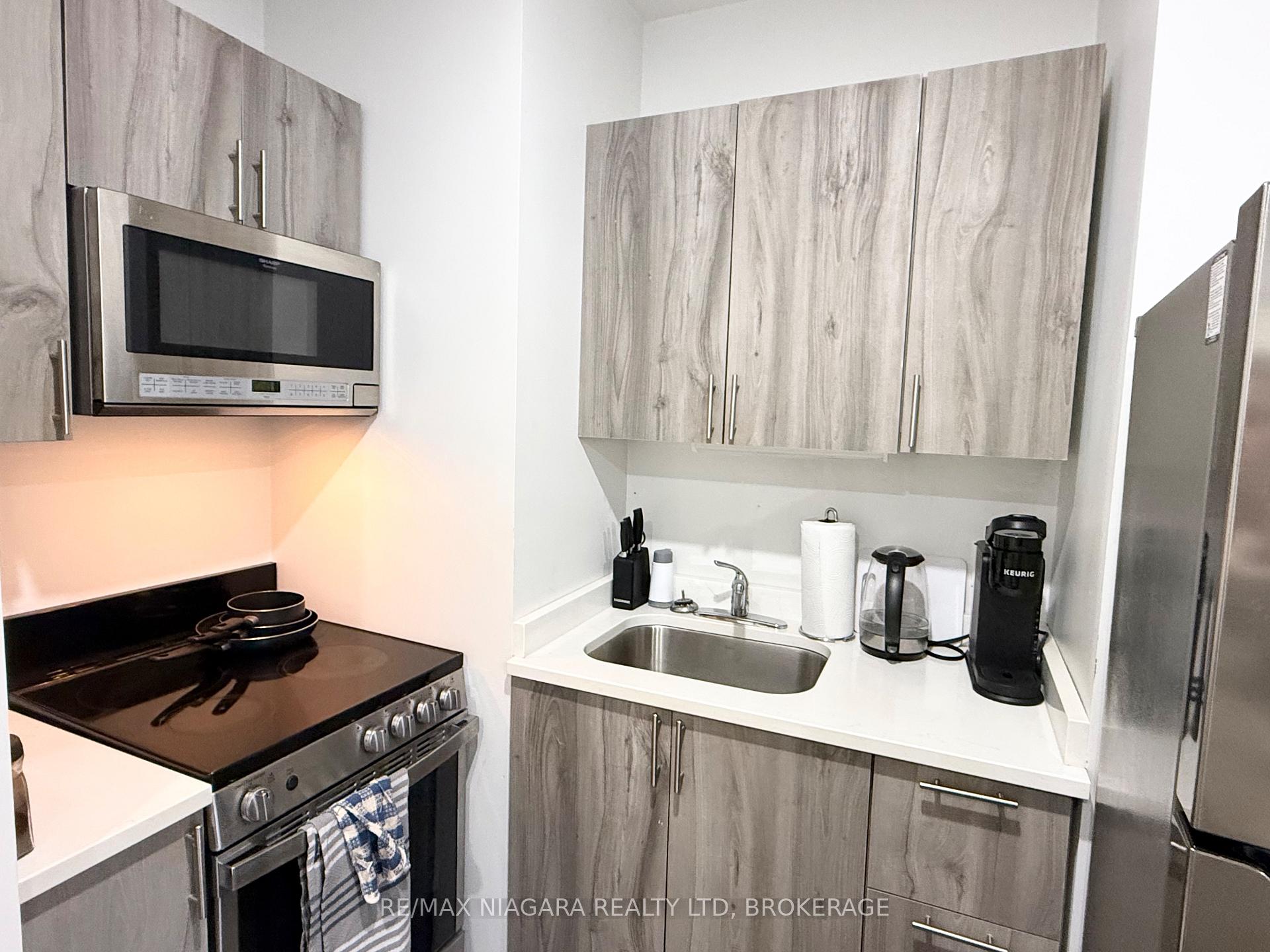 Photo 5 of Unit Unit 4, 4701 River Road, Niagara Falls, Downtown — HOMEH