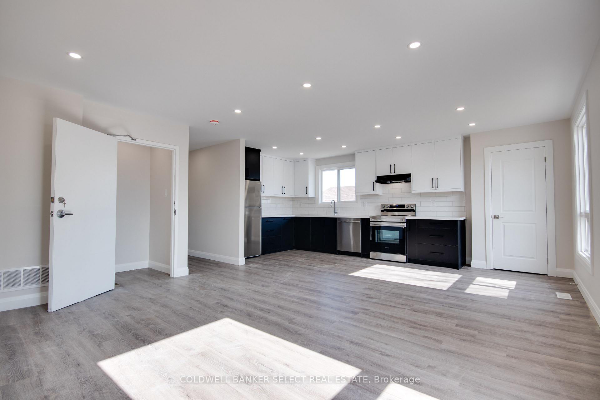 Photo 11 of Unit UPPER 1, 279 Barrick Road, Port Colborne, Main Street — HOMEH
