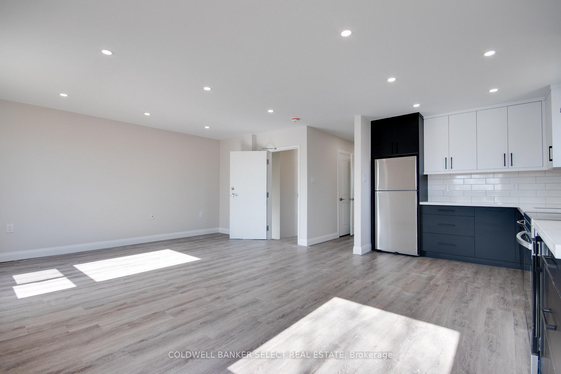 Photo 9 of Unit UPPER 1, 279 Barrick Road, Port Colborne, Main Street — HOMEH