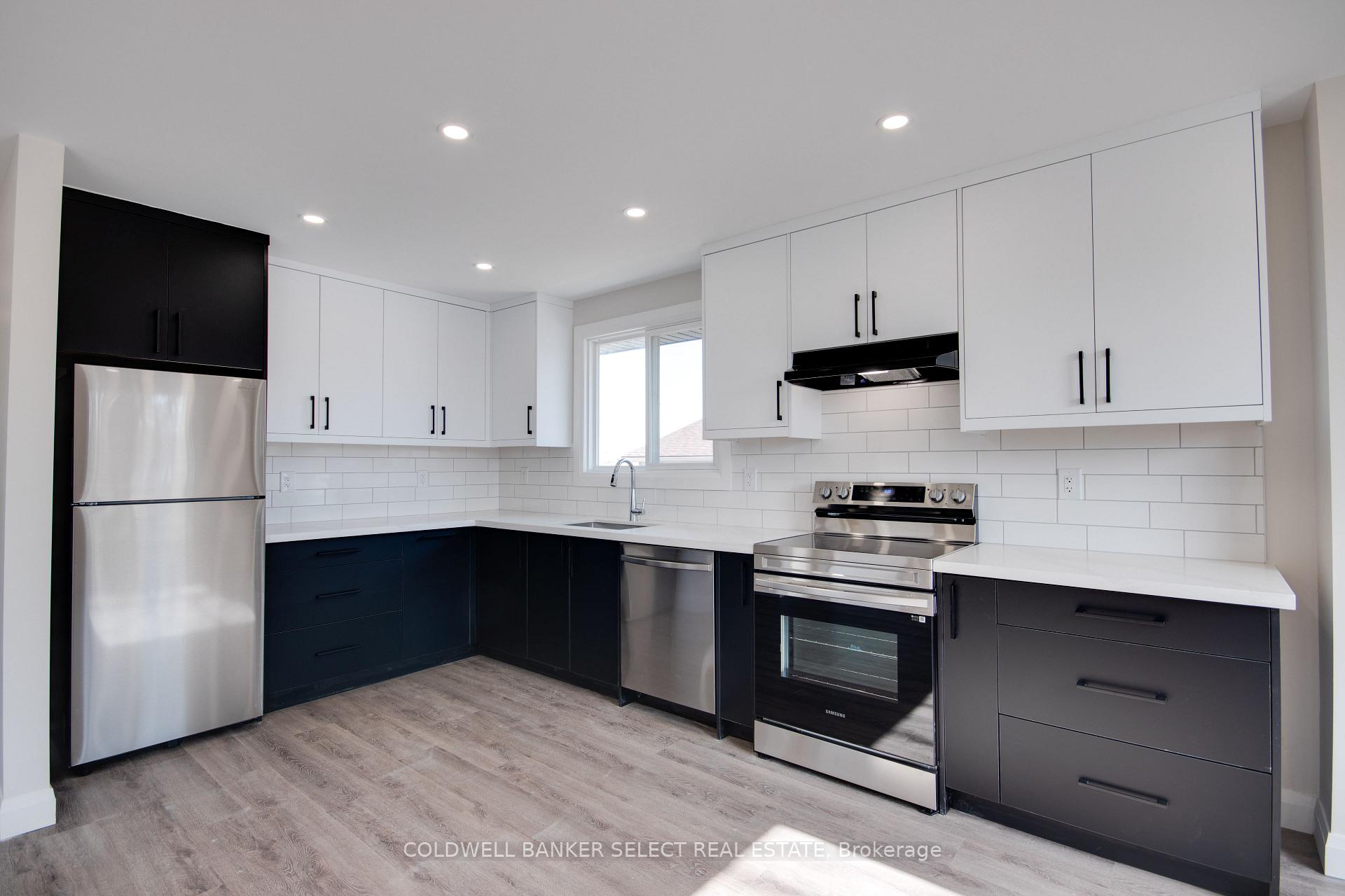Photo 10 of Unit UPPER 1, 279 Barrick Road, Port Colborne, Main Street — HOMEH