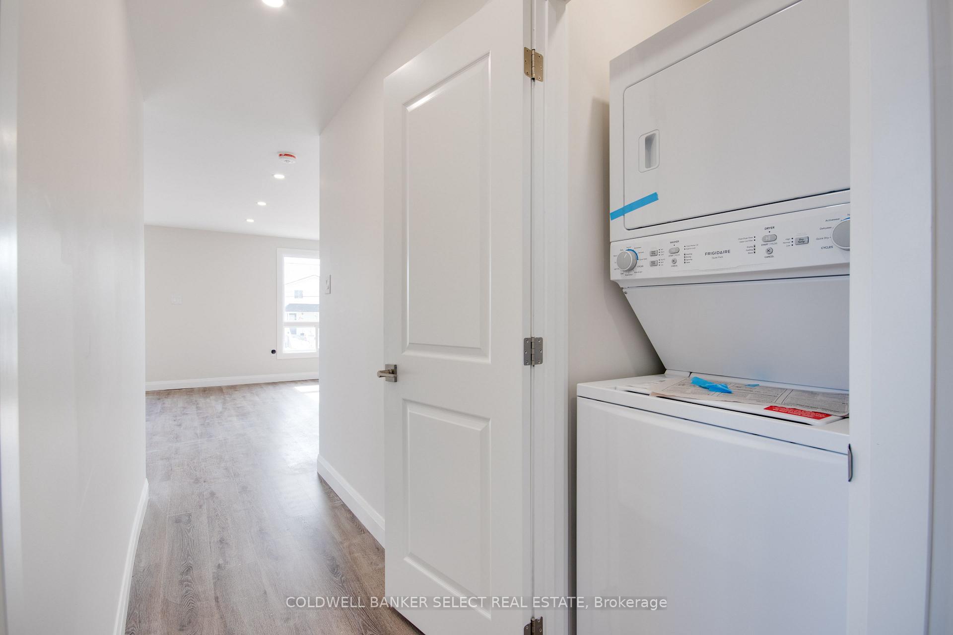 Photo 3 of Unit UPPER 1, 279 Barrick Road, Port Colborne, Main Street — HOMEH