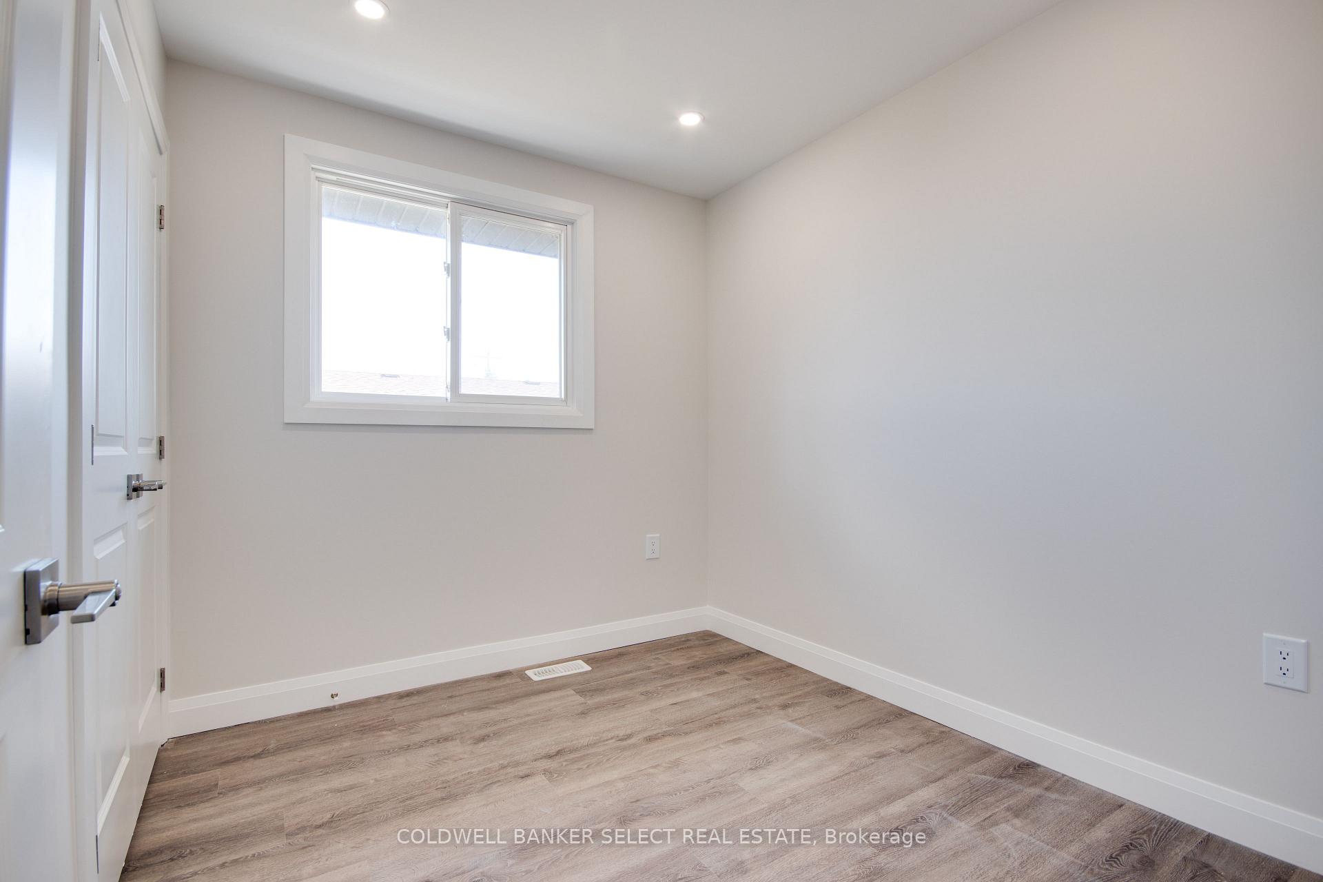 Photo 7 of Unit UPPER 1, 279 Barrick Road, Port Colborne, Main Street — HOMEH