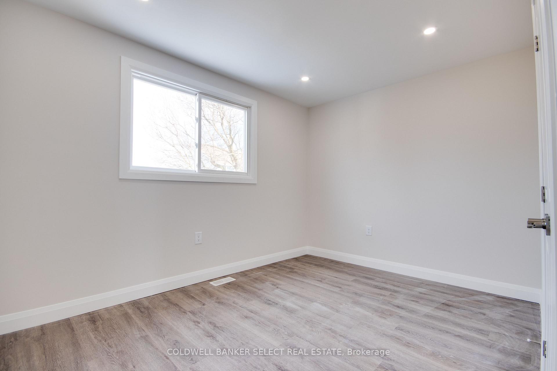 Photo 4 of Unit UPPER 1, 279 Barrick Road, Port Colborne, Main Street — HOMEH