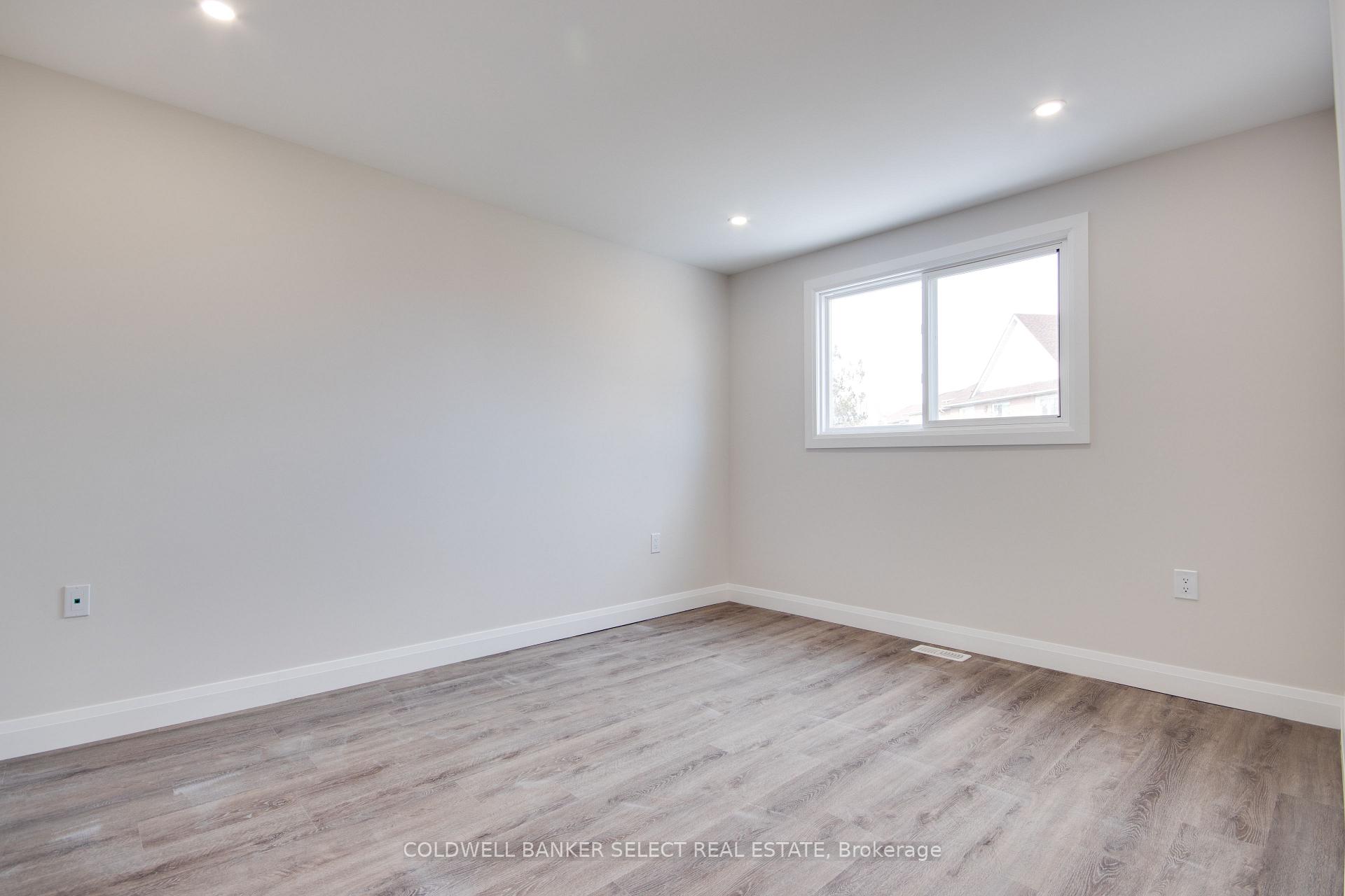 Photo 6 of Unit UPPER 1, 279 Barrick Road, Port Colborne, Main Street — HOMEH
