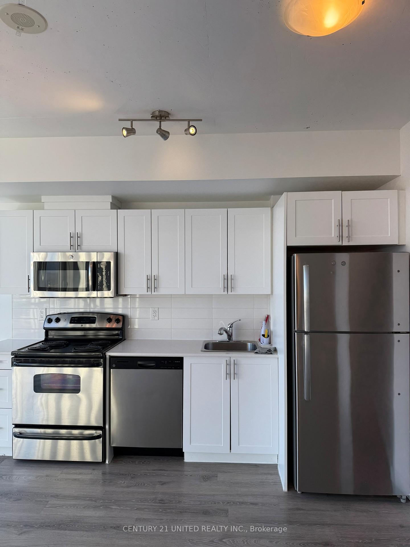 Photo 6 of Unit 420, 100 Bond Street E, Oshawa, Central — HOMEH