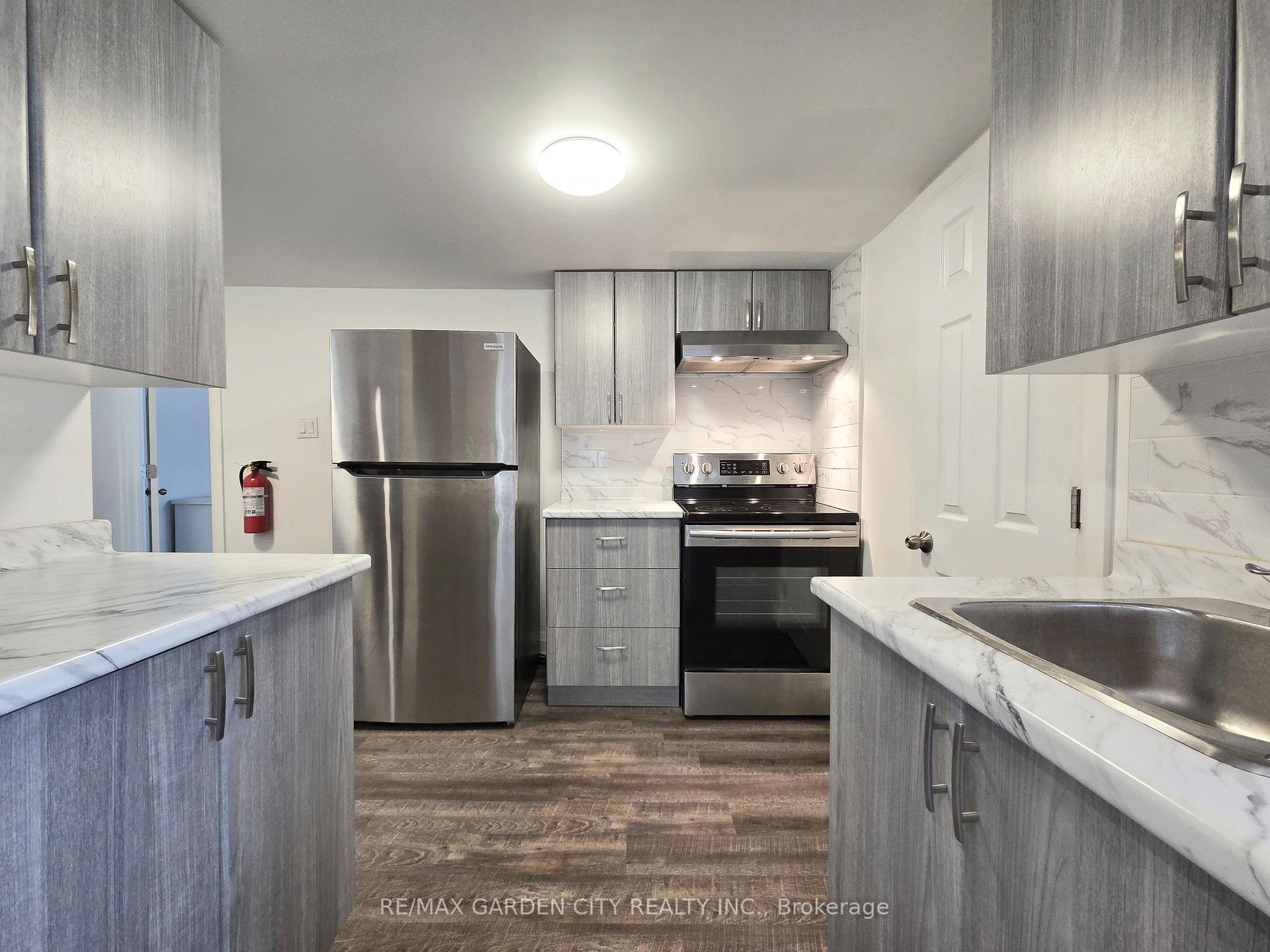 Photo 4 of Unit MAIN, 1 Robinson Street N, Grimsby, Grimsby East — HOMEH
