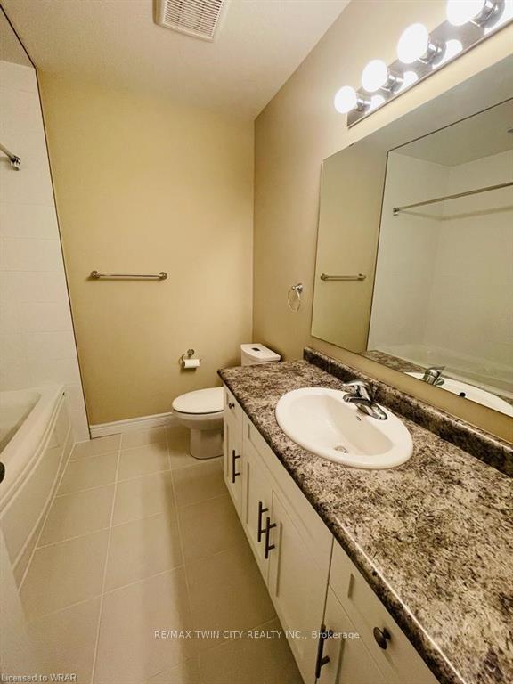 Photo 11 of Unit #H4, 70 Willowrun Drive, Kitchener — HOMEH