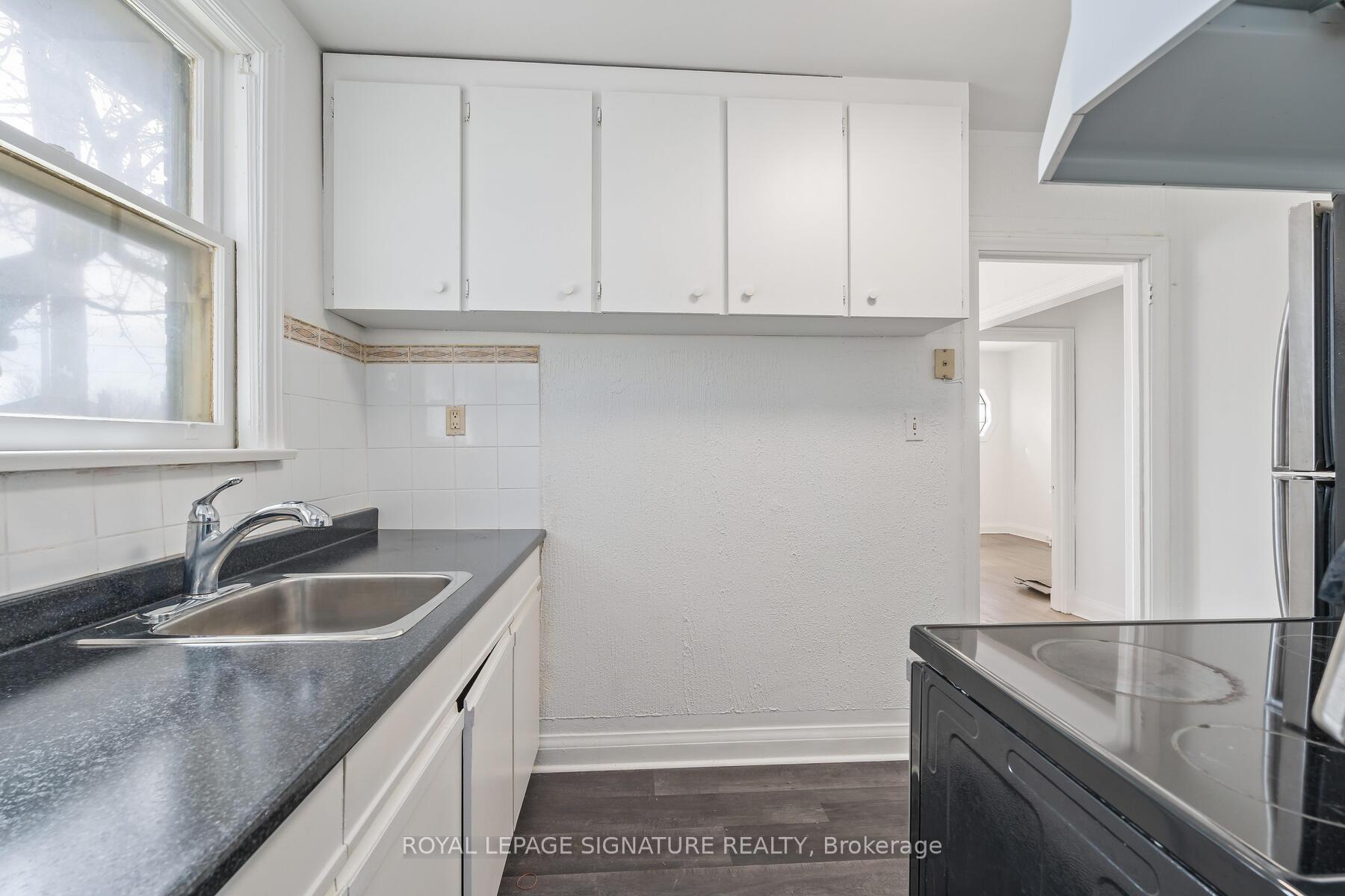 Photo 9 of 316 Cosburn Avenue, Toronto, East York — HOMEH