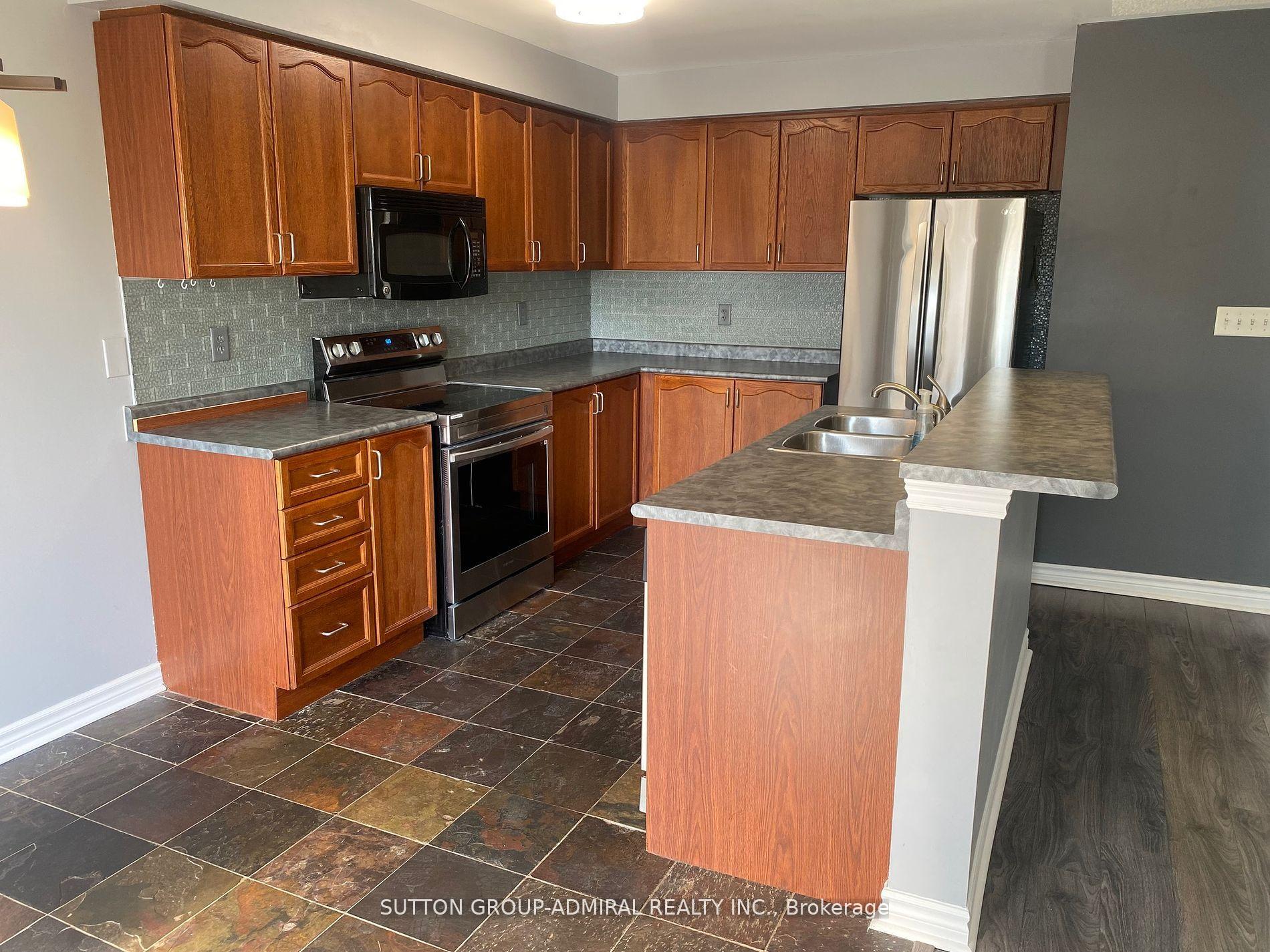 Photo 7 of Unit Main, 50 Maple Crown Terrace, Barrie, Innis-Shore — HOMEH