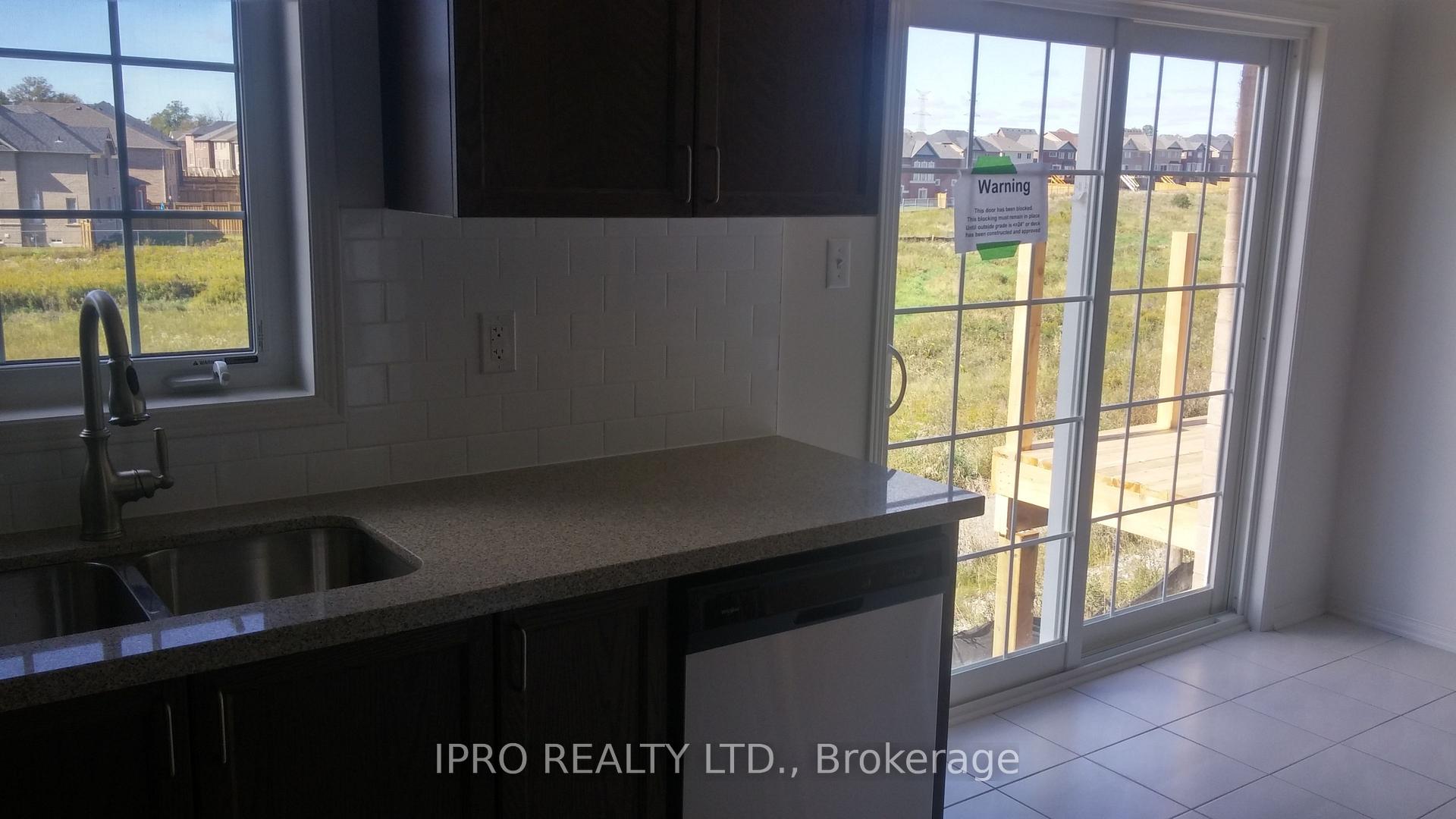 Photo 5 of Unit 56, 2452 Bromus Path, Oshawa, Windfields — HOMEH