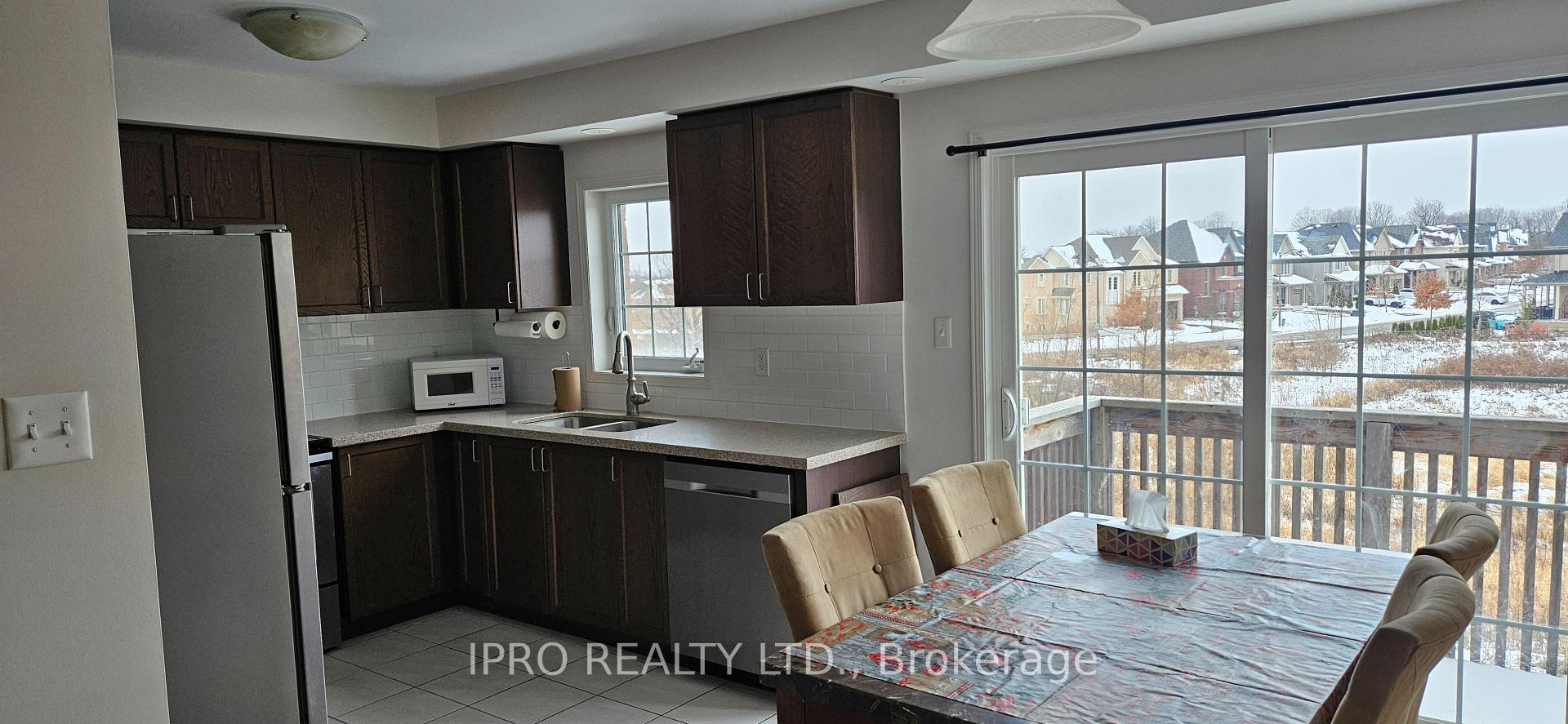 Photo 6 of Unit 56, 2452 Bromus Path, Oshawa, Windfields — HOMEH