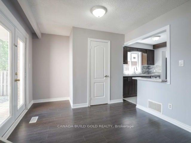 Photo 5 of 80 Carter Dr, Brampton, Brampton North — HOMEH