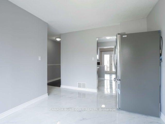 Photo 7 of 80 Carter Dr, Brampton, Brampton North — HOMEH