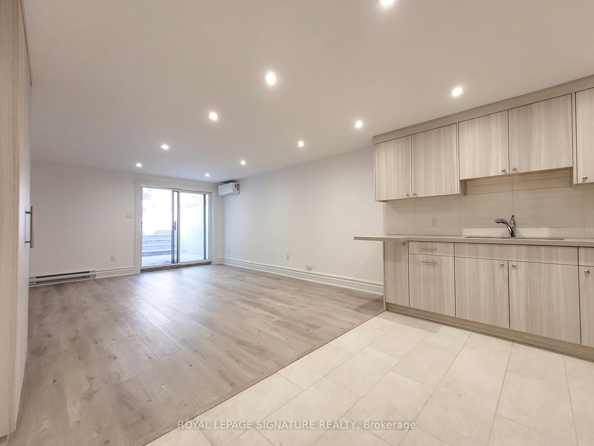 Photo 2 of Unit Lower, 18 Coxwell Avenue, Toronto, Greenwood-Coxwell — HOMEH
