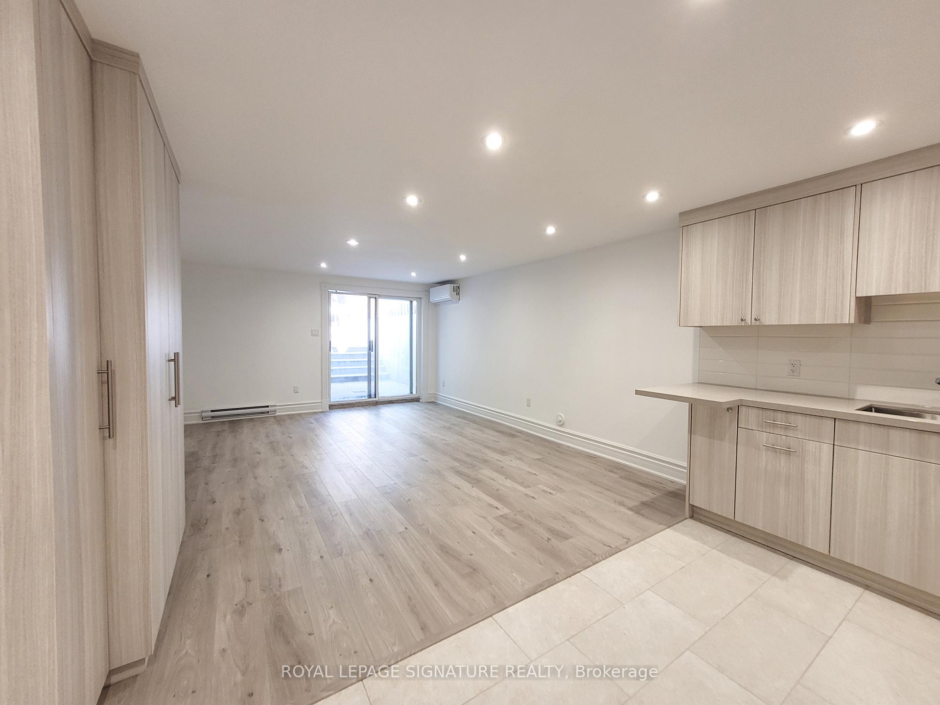 Photo 3 of Unit Lower, 18 Coxwell Avenue, Toronto, Greenwood-Coxwell — HOMEH