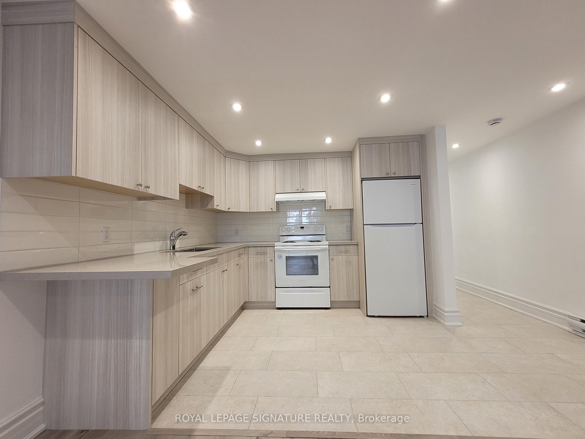Photo 4 of Unit Lower, 18 Coxwell Avenue, Toronto, Greenwood-Coxwell — HOMEH