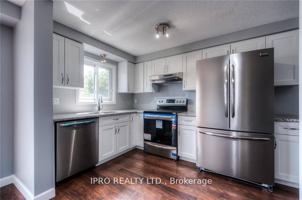Photo 4 of 298 Activa Avenue, Kitchener, Larentian West — HOMEH