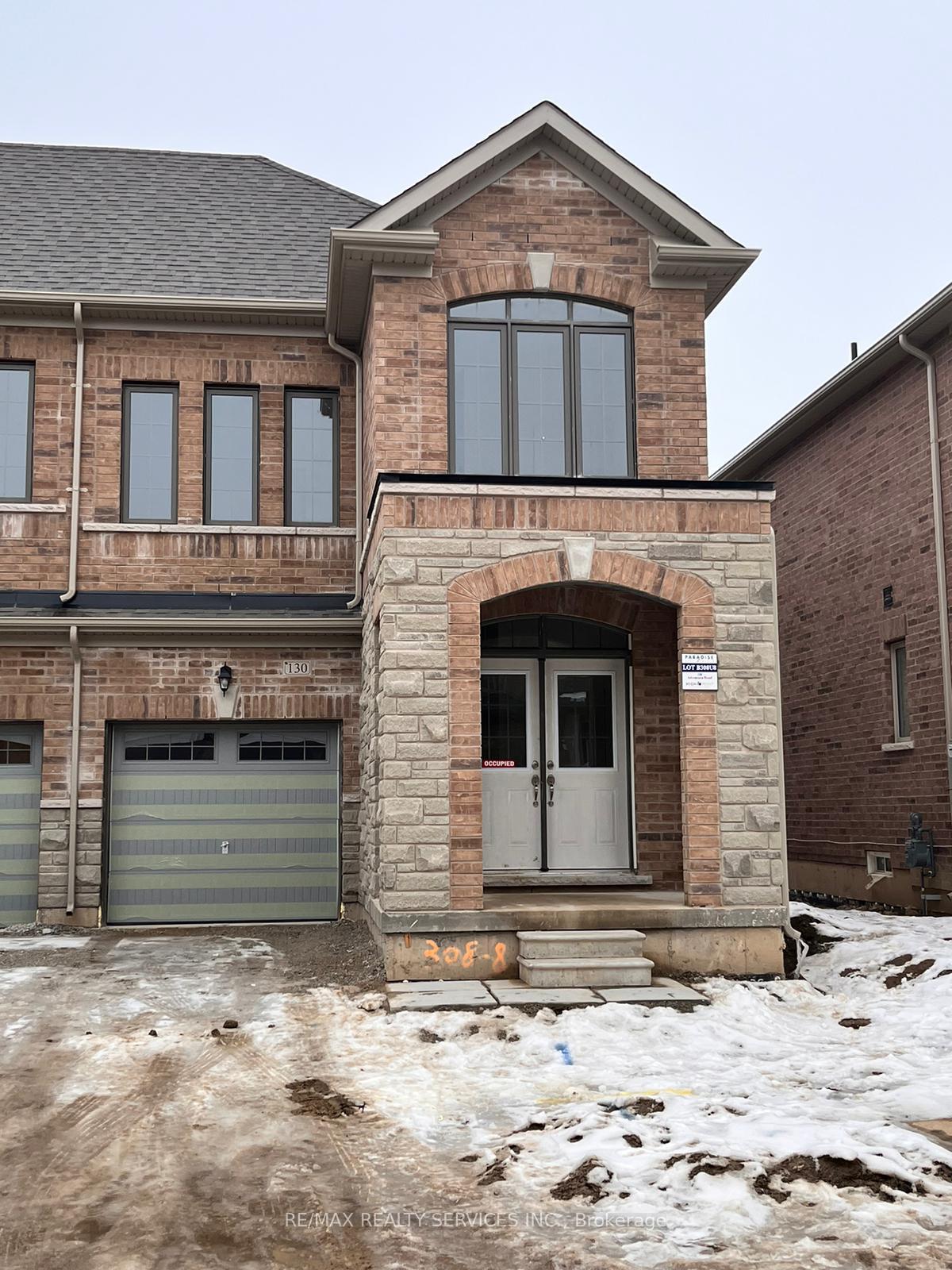 Front of 130 Adventura Road