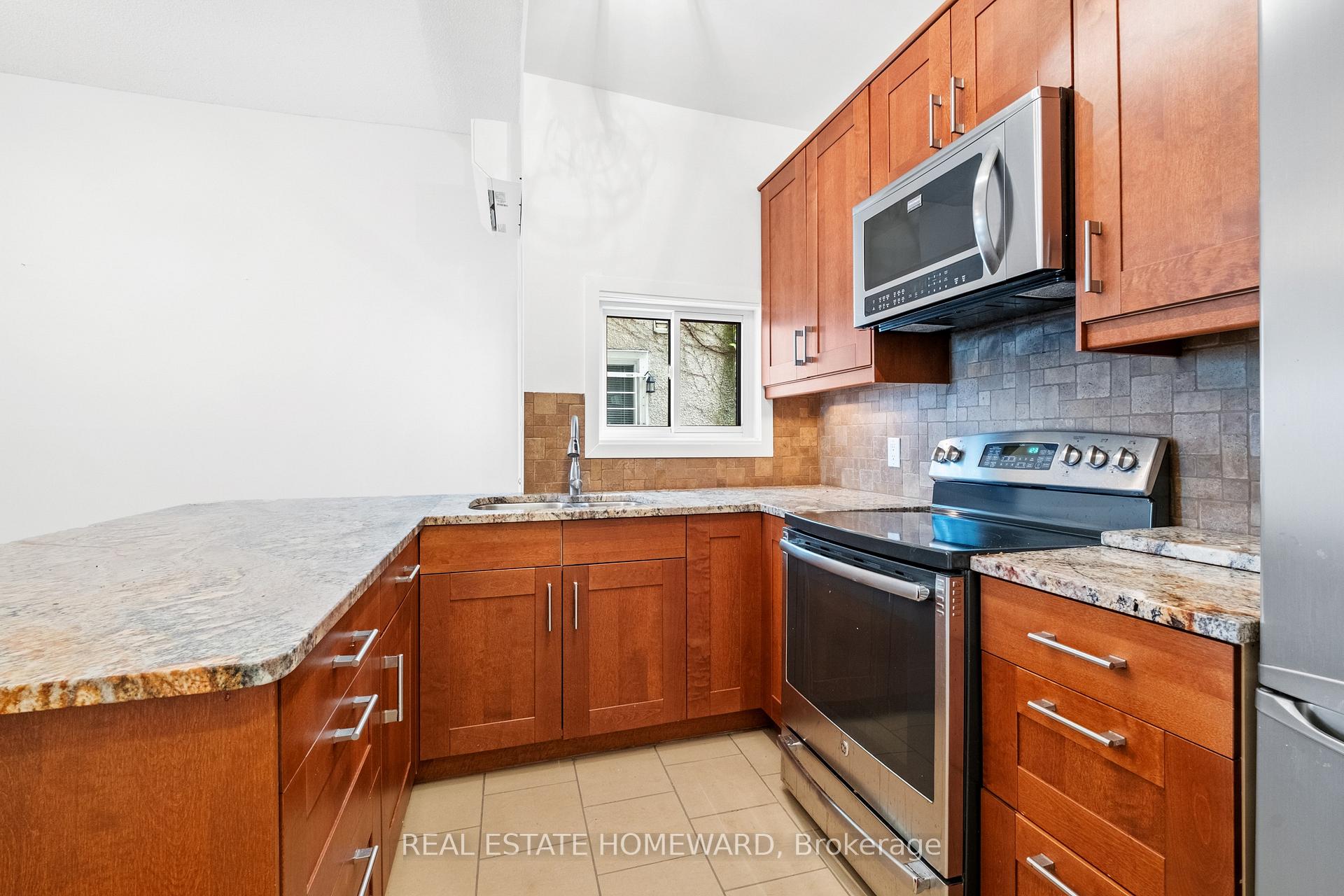 Photo 6 of Unit Main Fl & Lower, 163 Broadview Avenue, Toronto, South Riverdale — HOMEH