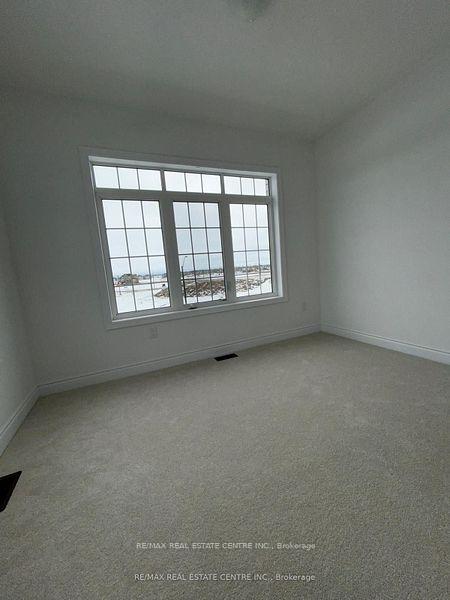Photo 3 of 23 Carriage Lane, Wasaga Beach — HOMEH