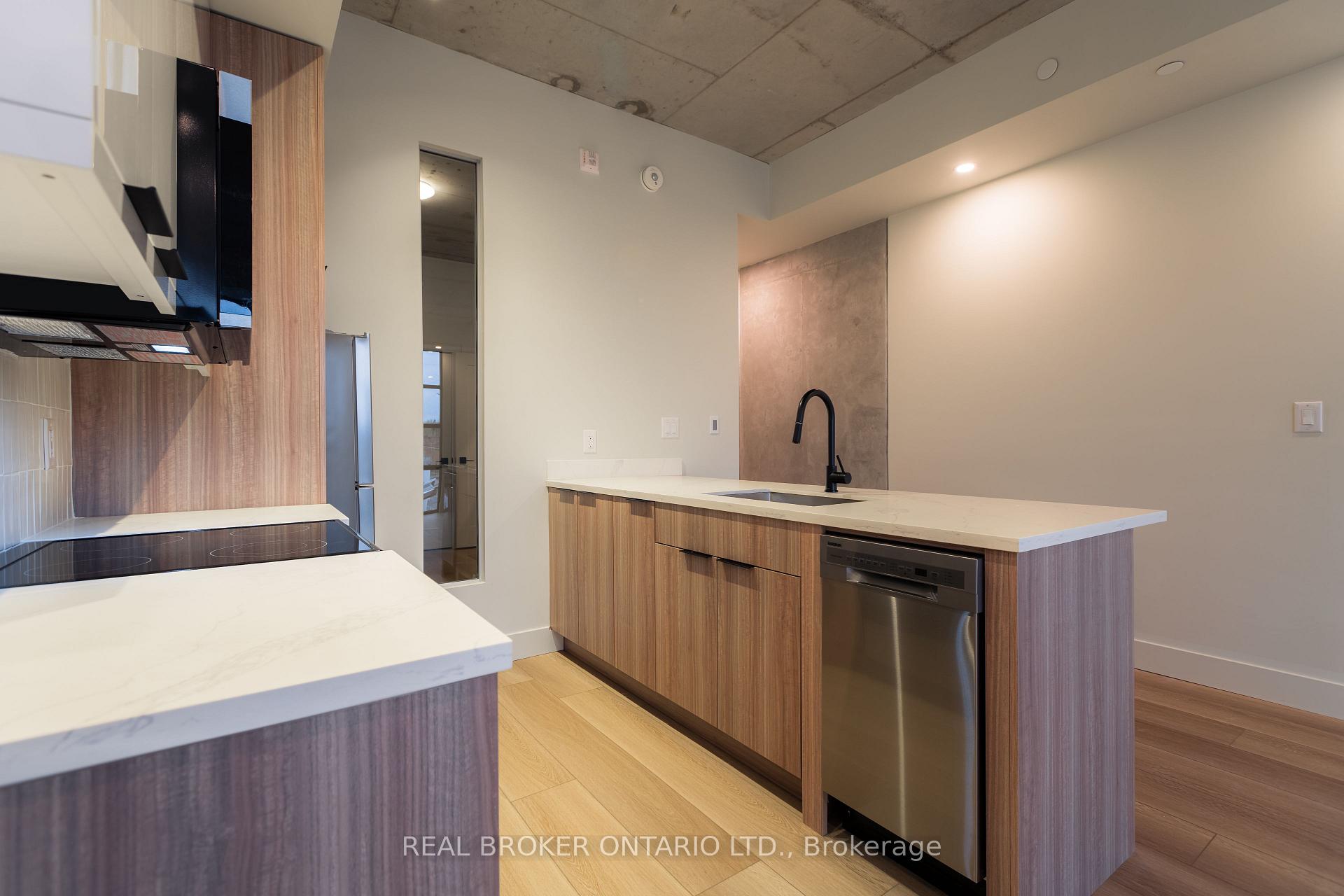 Photo 3 of Unit 404, 24 Augusta Street, Hamilton, Corktown — HOMEH