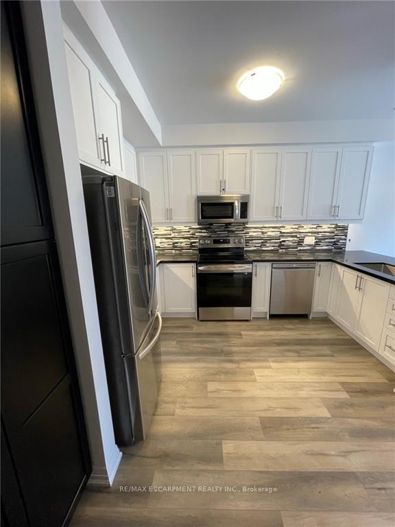 Photo 21 of Unit 106, 61 Soho Street, Hamilton, Stoney Creek — HOMEH