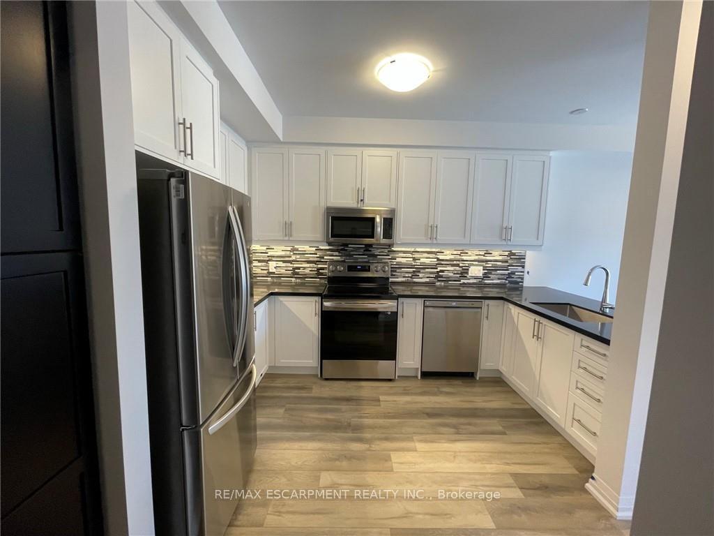 Photo 22 of Unit 106, 61 Soho Street, Hamilton, Stoney Creek — HOMEH