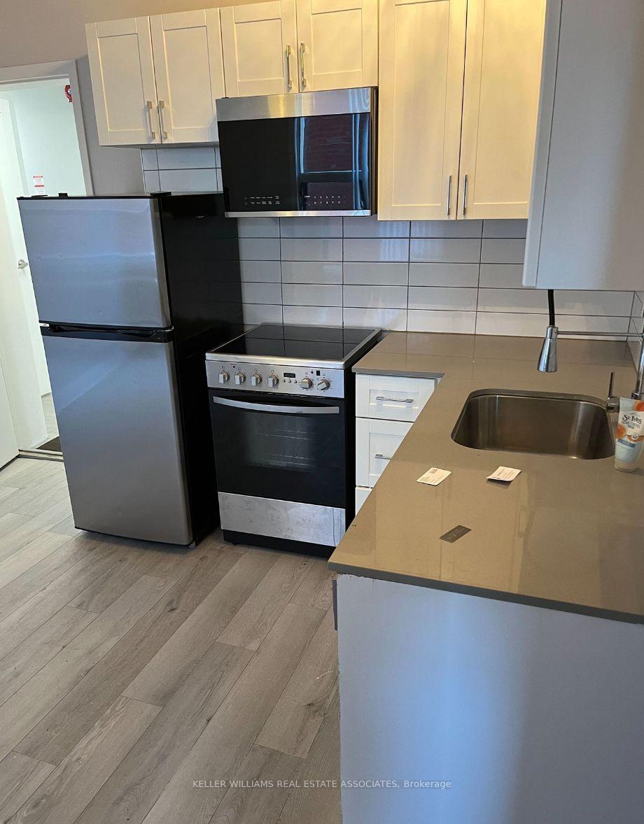 Photo 3 of Unit 104, 53 Dawes Road, Toronto, East End-Danforth — HOMEH