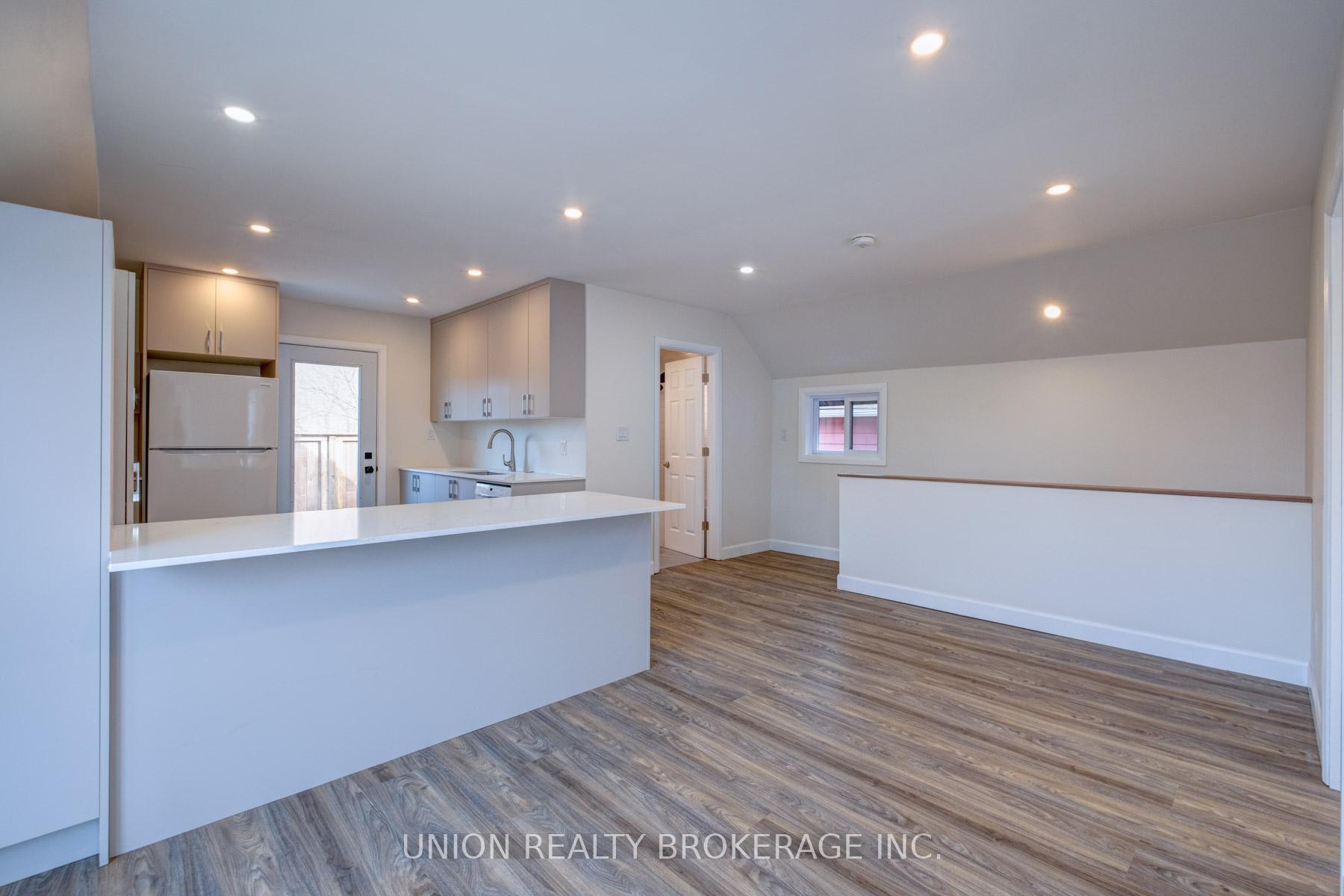 Photo 2 of Unit #UPPER, 20 Norwood Terrace, Toronto, East End-Danforth — HOMEH