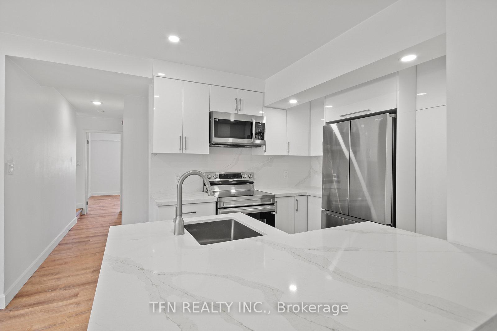 Photo 9 of Unit 203, 1328 Gerrard Street E, Toronto, Greenwood-Coxwell — HOMEH