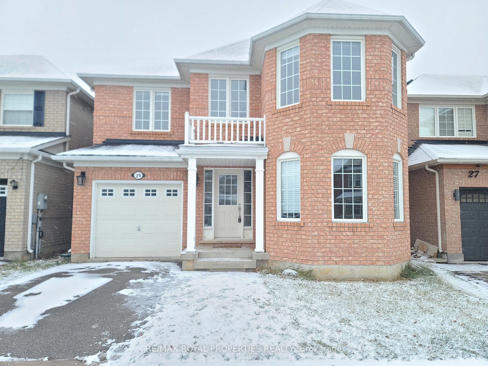 Front of 29 Roy Rainy Avenue