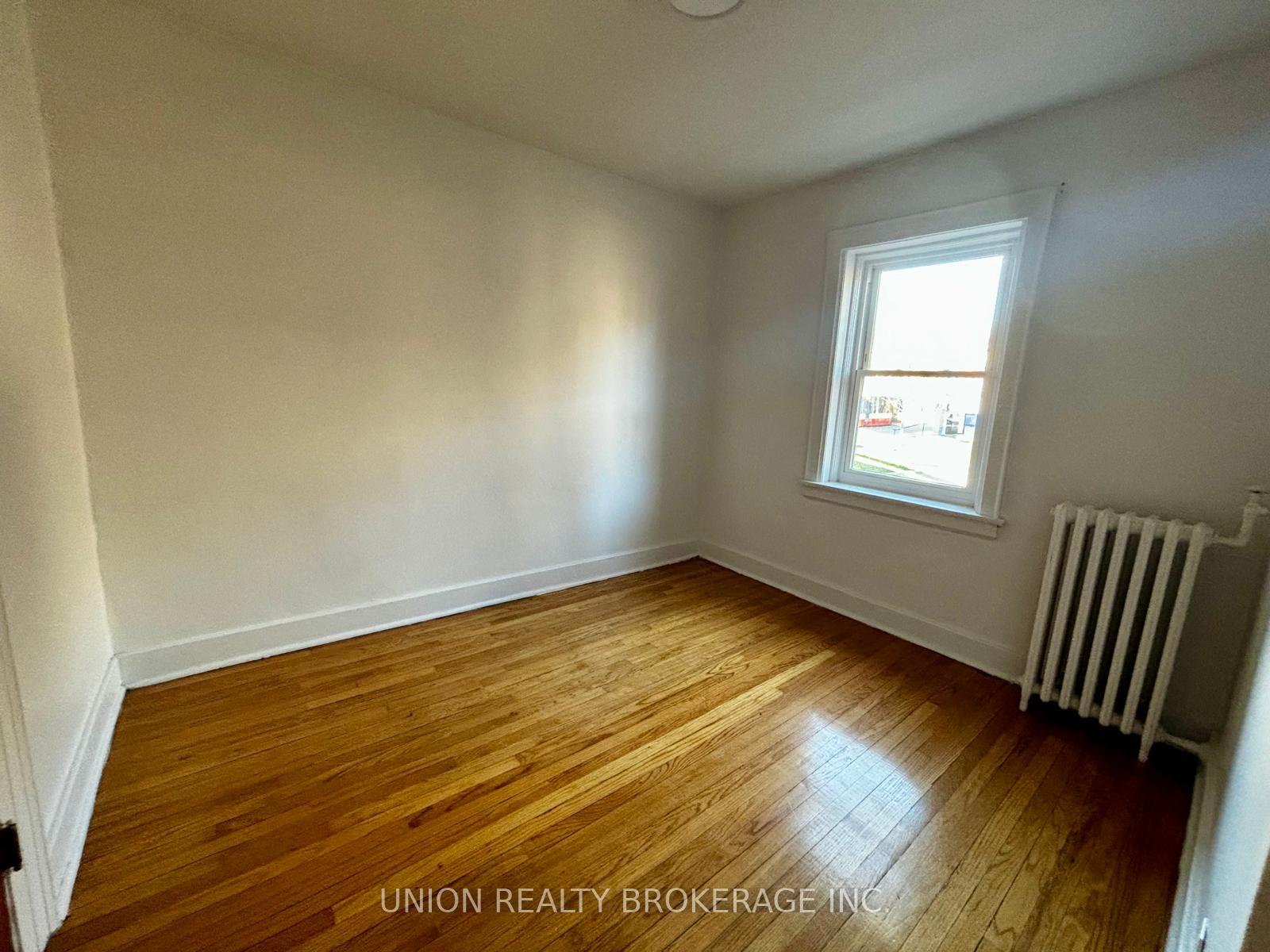 Photo 4 of Unit 203, 2405 Queen Street E, Toronto, The Beaches — HOMEH