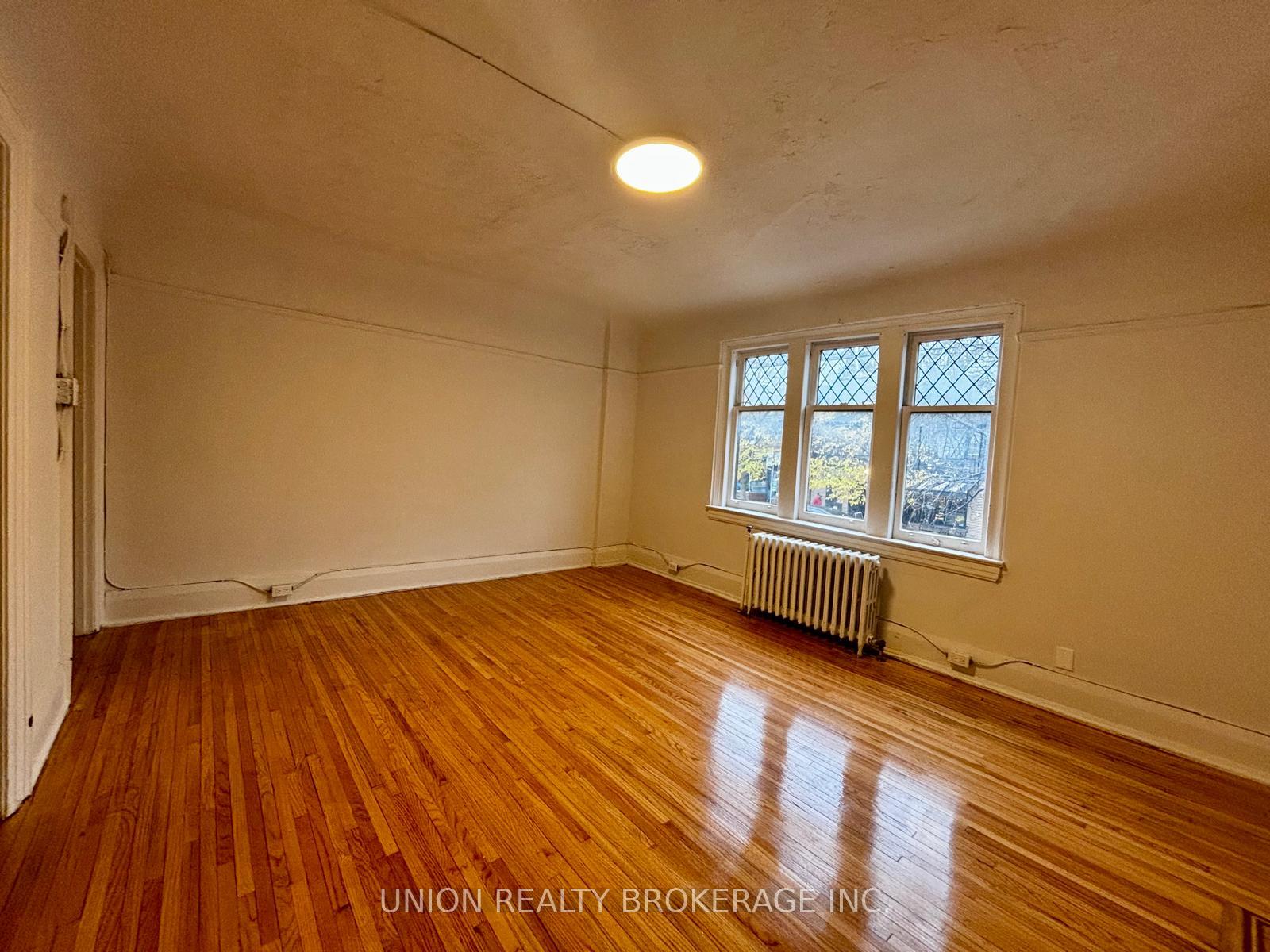 Photo 3 of Unit 8, 2393 Queen Street E, Toronto, The Beaches — HOMEH
