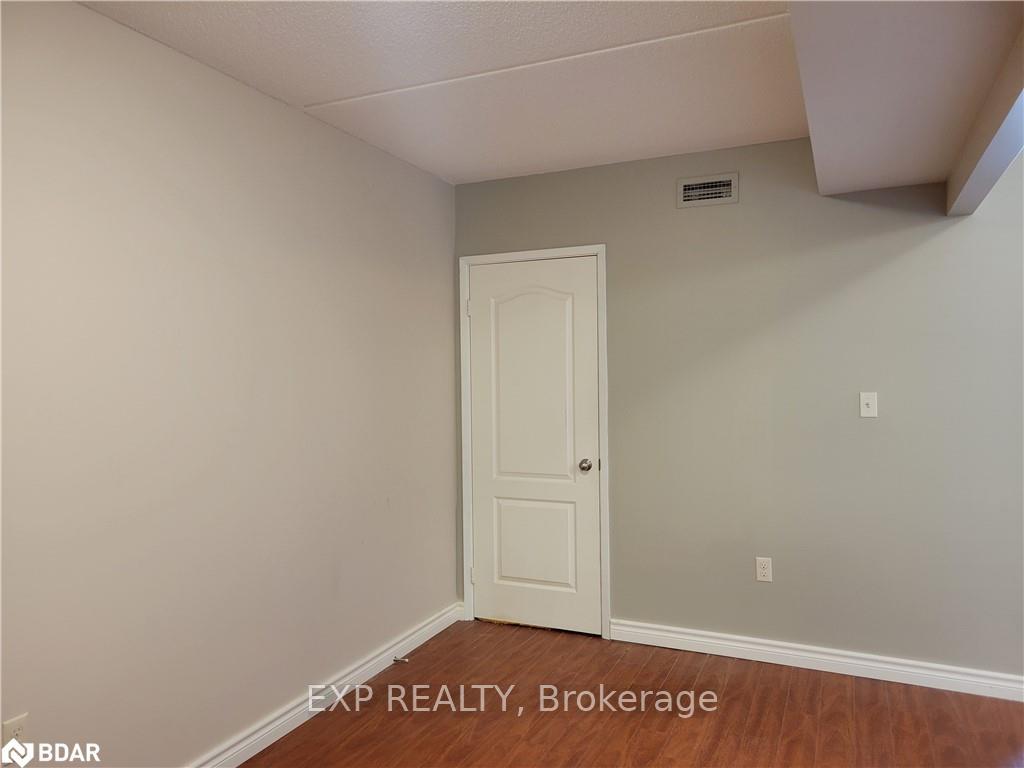 Photo 3 of Unit 411, 85 Barrie Road, Orillia — HOMEH